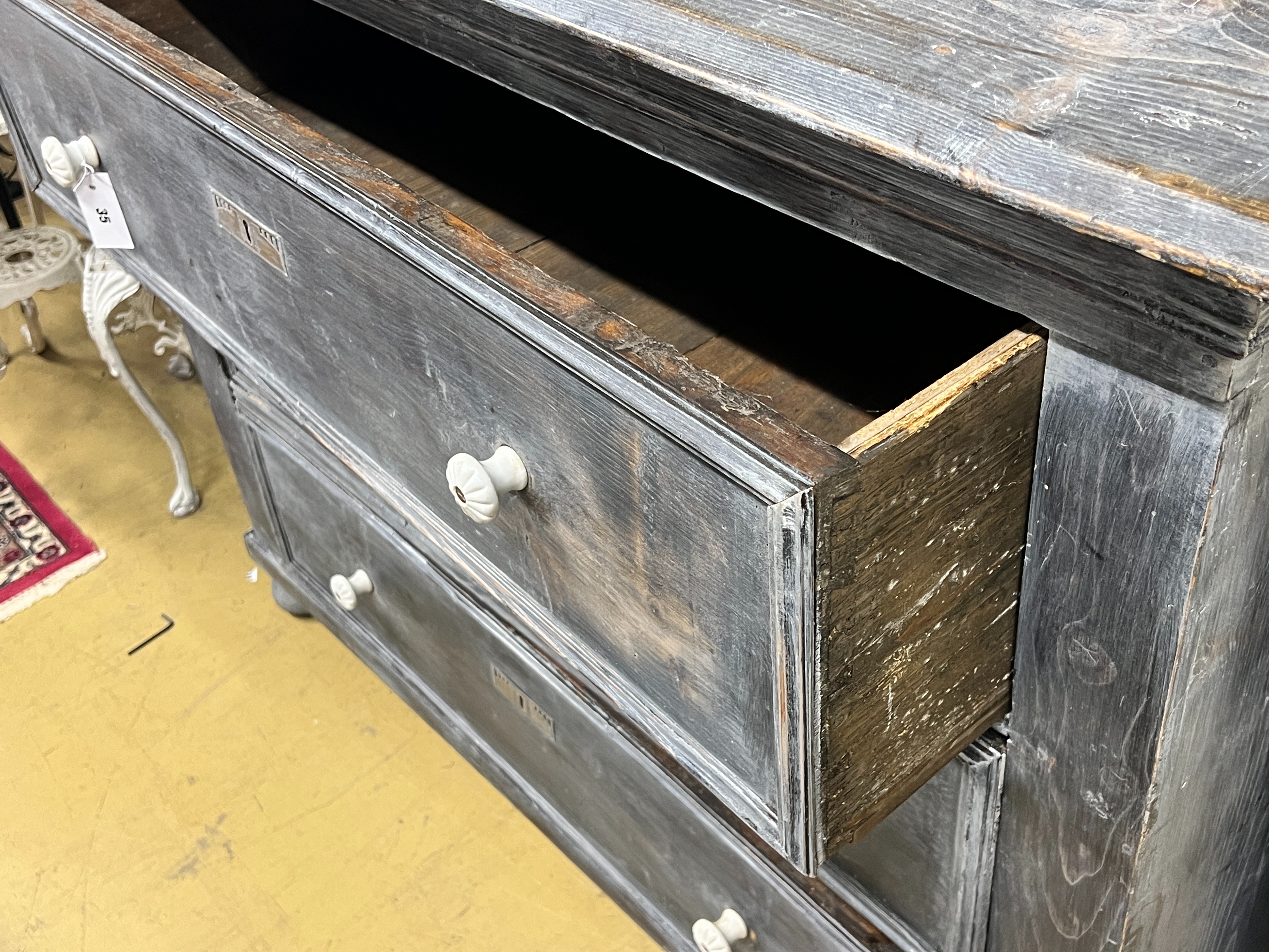 A 19th century East European painted pine three drawer chest, width 133cm, depth 62cm height 106cm